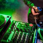 Why Do DJs Wear Headphones